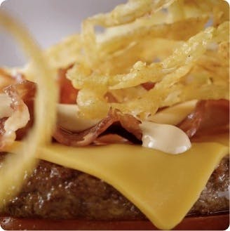 Burger patty with cheese and crispy onion