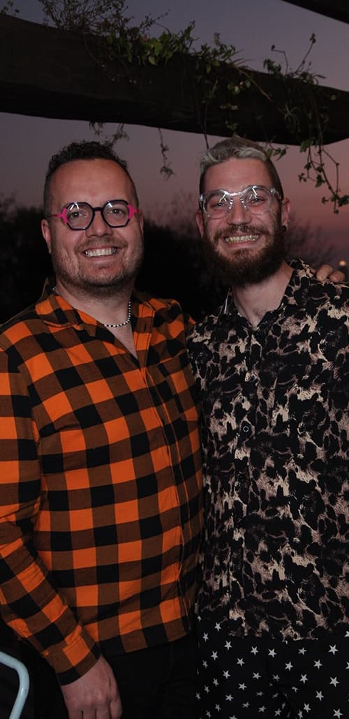 People smiling for the camera at a party