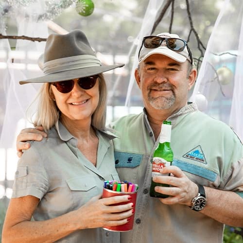 Man and woman smiling for the camera