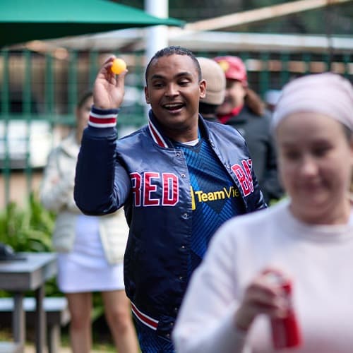 Person playing beer pong