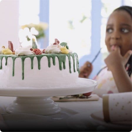 Milky Lane Nice’mas Cakes with girl in background